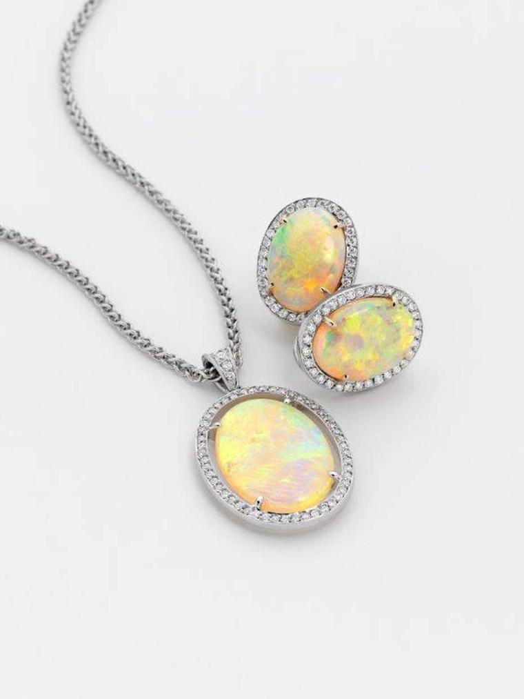 Percy Marks pendant featuring a 7.05ct Coober Pedy opal with brilliant-cut white diamonds on a white gold wheat chain, with matching earrings.